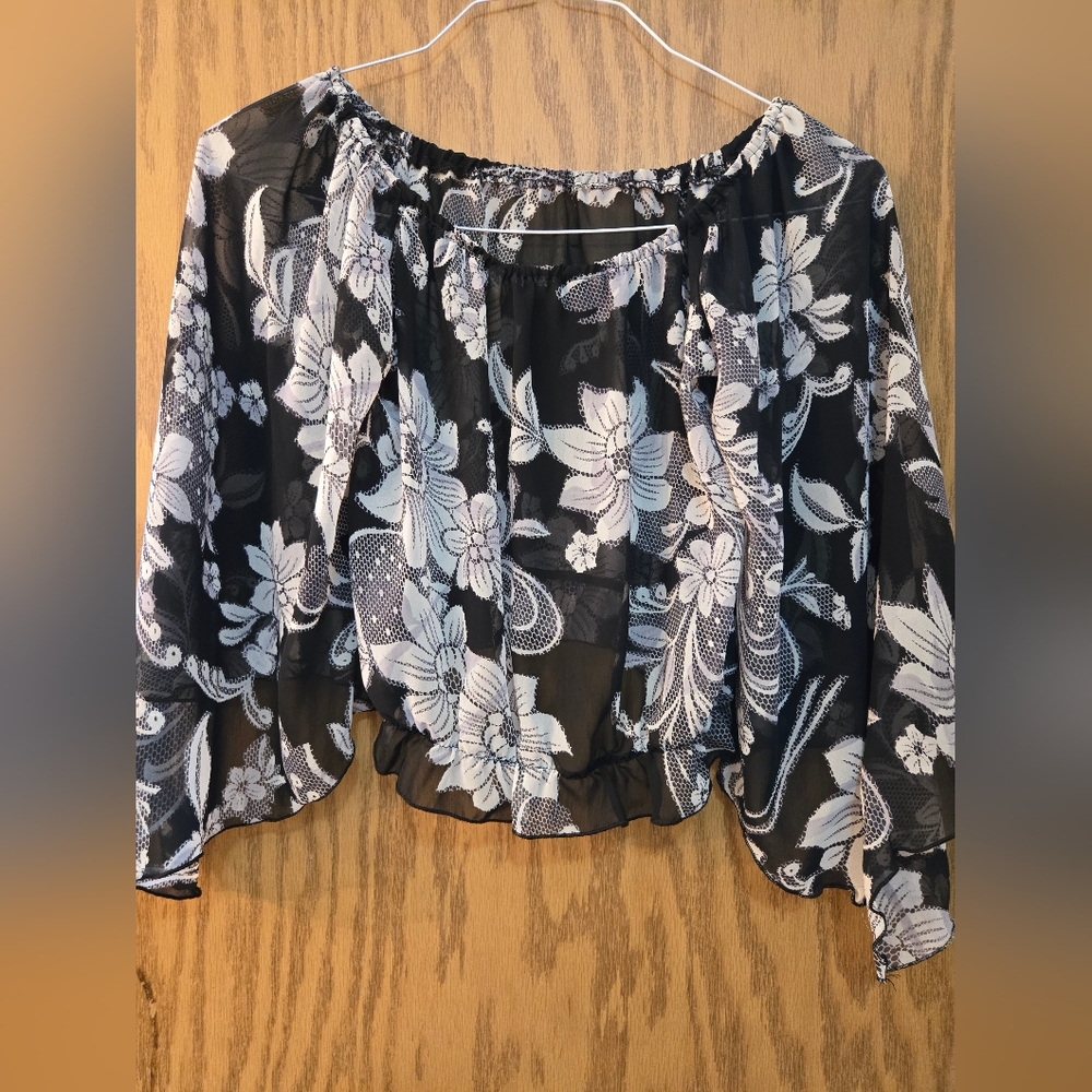 Pretty black and white sheer blouse with elastic at waist and flowy long sleeves